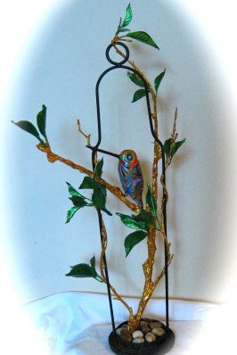 papie-mache bird in tree banches made for sister by pamela spiro wagner, 